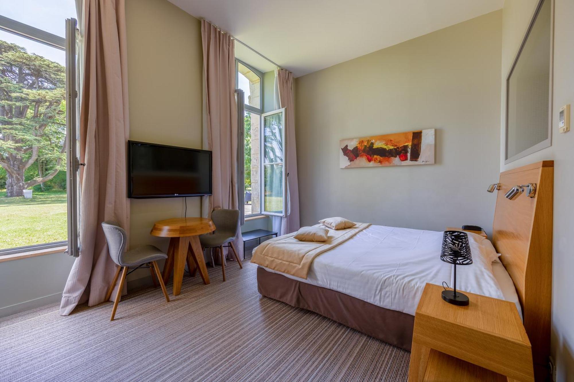 Hotel Et Spa Du Chateau Лагор Стая снимка