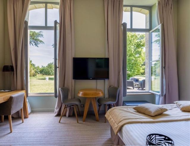 Hotel Et Spa Du Chateau Лагор Екстериор снимка